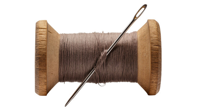 Antique wooden thread spool with grey thread and metal needle, isolated on transparent background