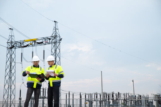 Power Grid Inspection by Electrical Engineers at Industrial Energy Infrastructure Facility