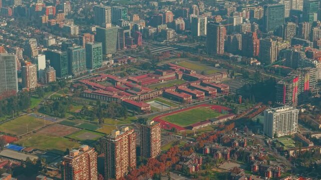 Drone Aerial Establishing of Militar del Libertador Bernardo OHiggins Campus School and Las Condes Cityscape in Santiago de Chile