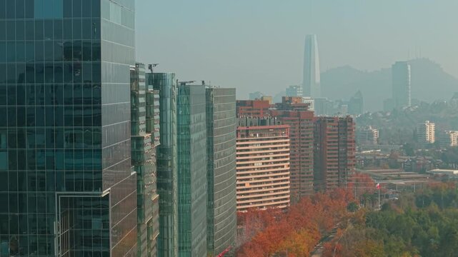 Drone Aerial Dolly In Modern Nueva Las Condes Skyscrapers and Costanera Center Skyline in Santiago de Chile