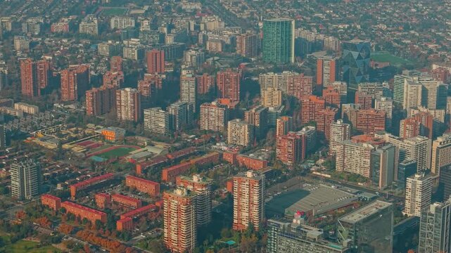Aerial High Angle of Dense Residential Suburb and Apartment Towers in Las Condes Santiago de Chile, Drone View