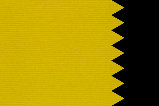 striped mustard cardboard against black zigzag band at right side