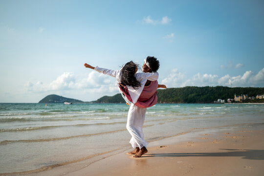 Couple enjoying their tropical vacation with peace of mind, secured by reliable travel insurance