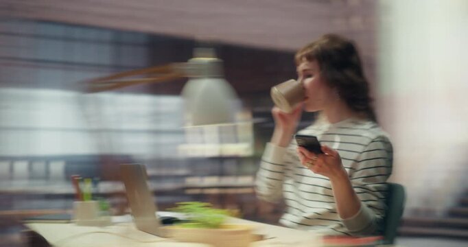 Timelapse 360 Degree. Woman Works on Laptop in Loft Office, Analyzing Ecommerce Dashboard, Tracking Sales Metrics and Streamlining Digital Business Operations. Orbital Cinematic Arc Tracking Shot.