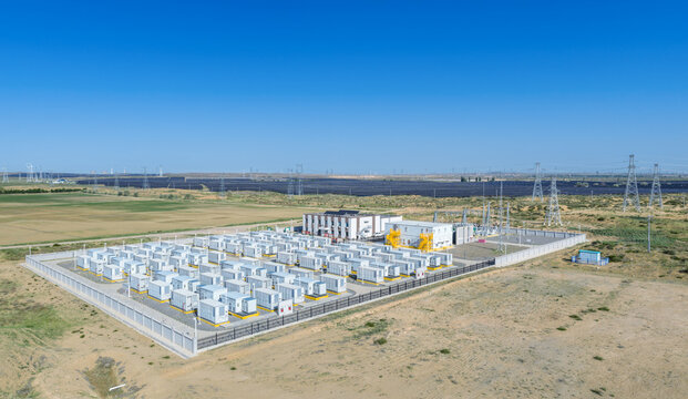 Aerial View of a Large-Scale Battery Energy Storage Power Station Next to Solar Farm