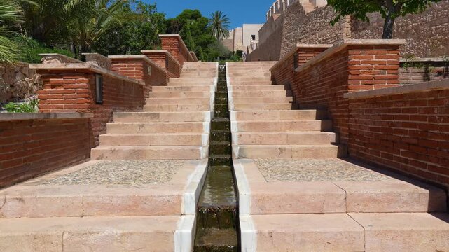 Stone stairway with a narrow water channel inside the Alcazaba of Almeria fortress in Andalusia, Spain, a filming location for Game of Thrones Dorne scenes