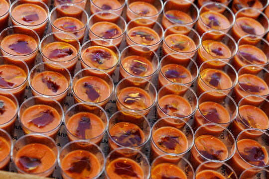 Rows of Gazpacho Cold Soup Appetizers in Plastic Cups