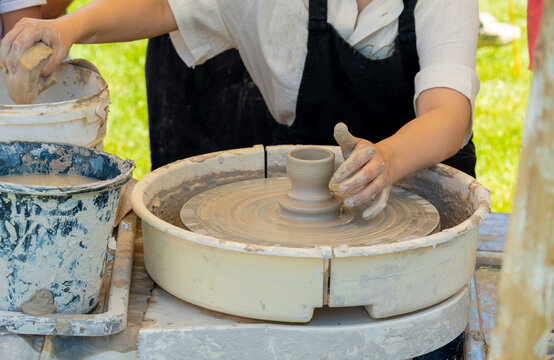 Clay pottery making, handmade ceramic workshop outdoors