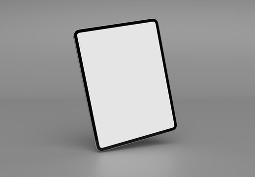 Modern tablet with shadow isolated and standing on clean grey background Mockup. Silver color. 3D rendering