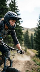 Fototapeta premium Confident young woman preparing for a mountain bike ride on a dusty trail with mountains in the vertical format