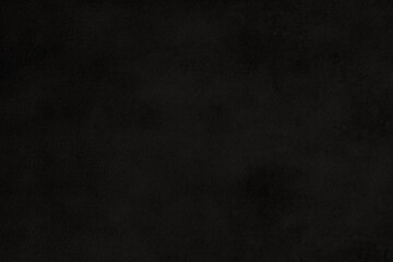 Obraz premium Dark, textured black background with a subtle, smoky appearance.
