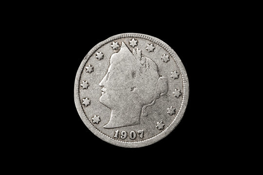 United States of America 1907 Liberty Head nickel five cents coin obverse also known as the V nickel cut out and isolated on a black background, USA American coinage stock photo