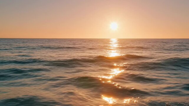 ?Tranquil sunset over ocean waves creating a serene reflection