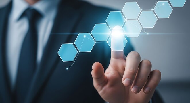 Hand touching glowing hexagonal interface finger