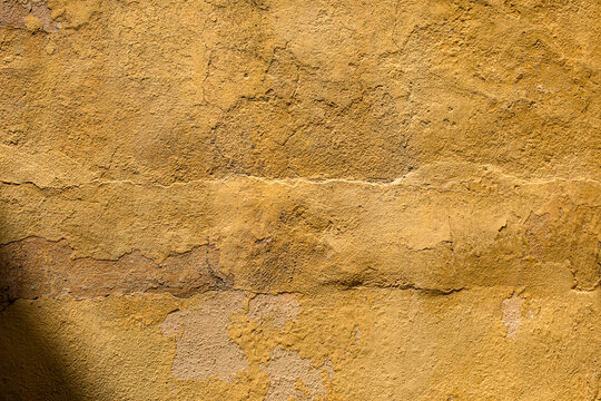 Old ochre textured wall
