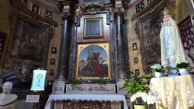 Side altar with statue of Our Lady of Fatima in Santa Maria in Traspontina church in Rome