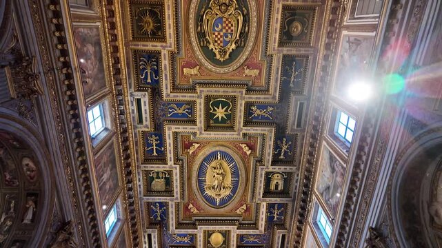 Interior view of the ornate ceiling and historic Church of San Marcello al Corso in Rome Italy