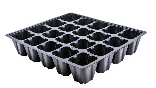Black plastic seedling tray with 24 individual cells, isolated on transparent background