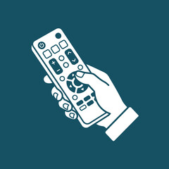 A modern remote control rests in hand with glowing buttons © komi