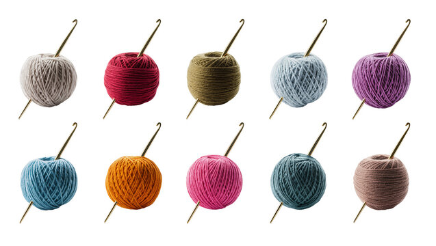 Isolated collection of vibrant yarn balls and golden crochet hooks for creative crafting