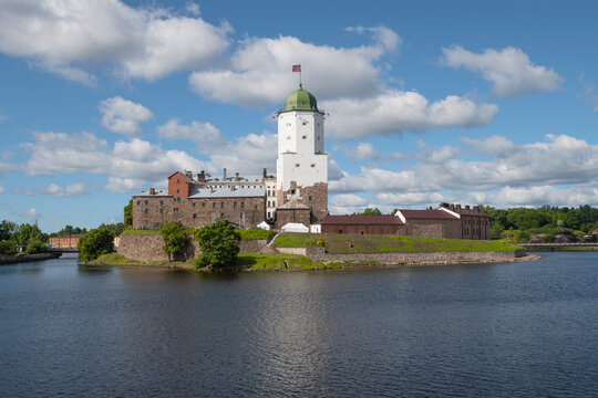 The ancient Vyborg castle in a summer landscape on a sunny June day. Leningrad oblast, Russia