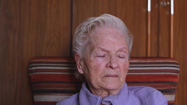elderly woman crying  with depression and sadness. negative emotions and loneliness. bad news and mental health.