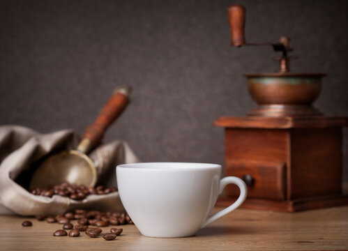 Coffee cup and coffee grinder