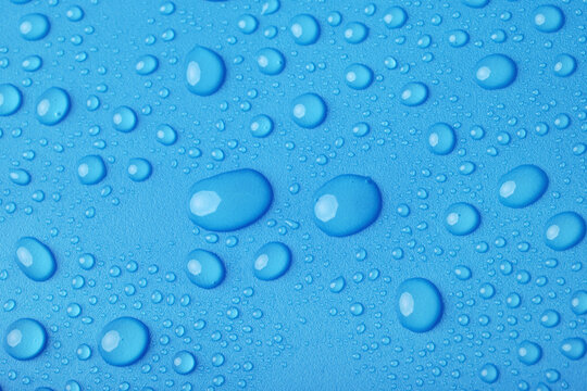 Blue water drops background