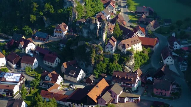 Aerial view above the old town in the city Pottenstein , on a sunny noon in Spring in Germany, Bavaria