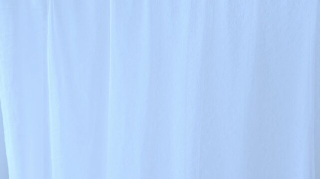 Wedding blue fabric silk luxury smooth waving, gently flutters, sways delicately, minimalistic background, homely romantic atmosphere comfort, tranquil ambiance, relaxation and calm