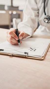 Medical doctor completing administrative healthcare records