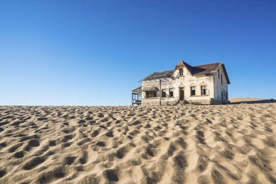 Colonial house, old mining town Kolmanskop or Coleman's hill, near L&uuml;deritz, Namibia