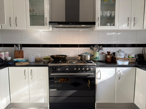 Uncle's kitchen interior with cupboards and oven stove