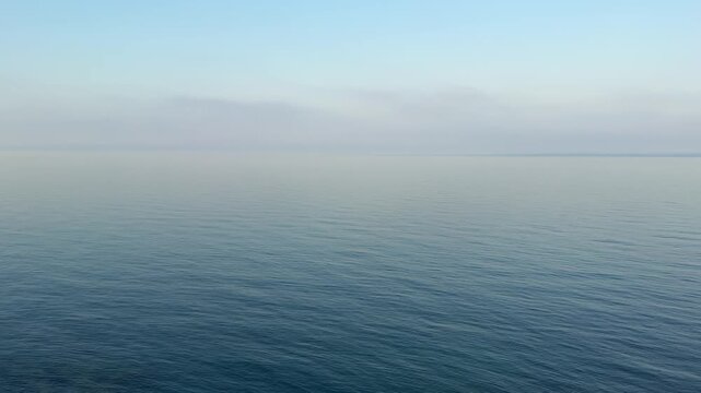 Gentle lapping of the sea and and birds chirping, video with sound.