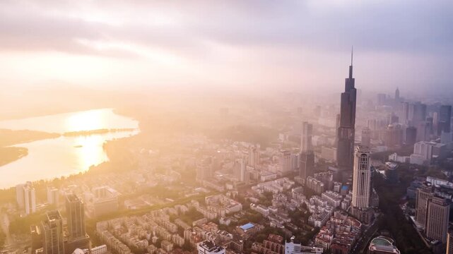 Aerial timelapse of the sunrise glow over the skyline of Xuanwu Lake in Nanjing, Jiangsu Province, China