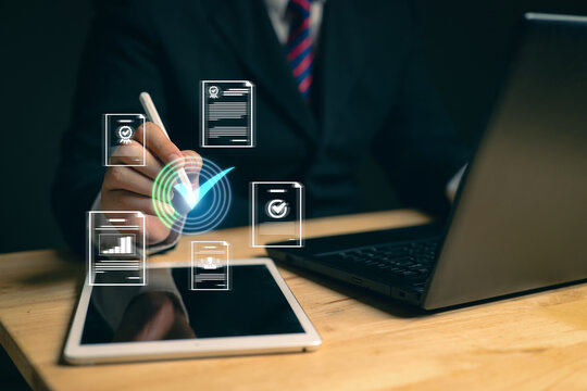 oung business woman using laptop surveys online checklist Complete the digital form checklist via the internet..Business performance checklist concept Y