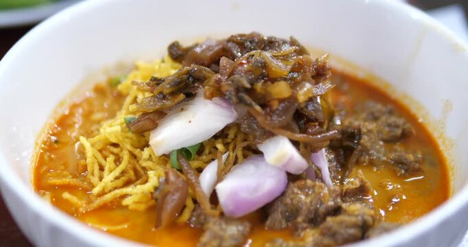 Close up of northern Thai beef khao soi noodle curry soup