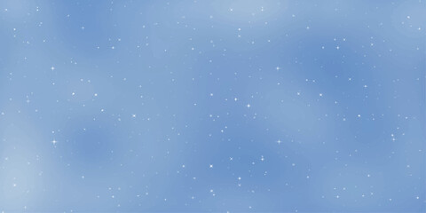 Softly falling snowflakes drift against a serene, pale blue winter sky, creating a tranquil and ethereal atmosphere perfect for holiday and seasonal themes. © Md