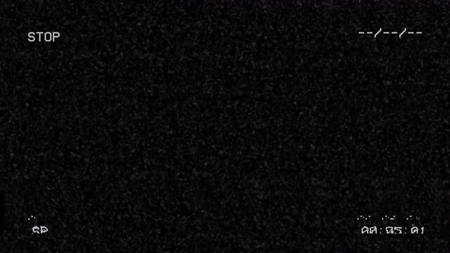 Old damaged vhs stop screen with heavy analog noise and grain
