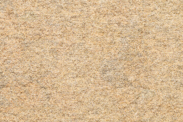 Fototapeta premium Neutral beige burlap weave with a coarse natural fiber surface, suitable as a rustic backdrop or textile texture with even soft lighting and detailed grain