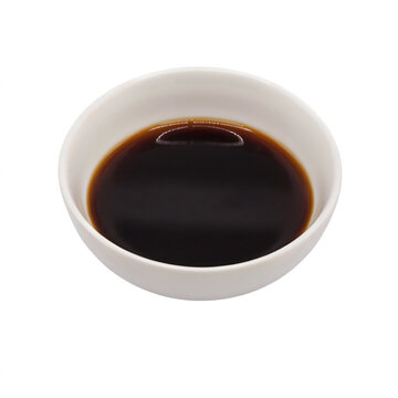 Bowl of dark soy sauce isolated on transparent background for dipping and cooking, food ingredient
