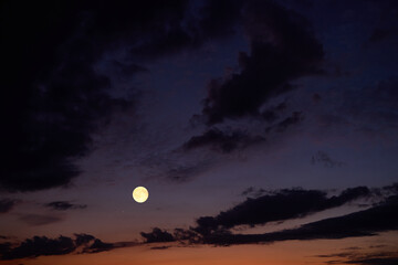 Fototapeta premium Full Moon on a twilight background.