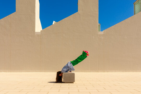 Person Doing a Headstand 