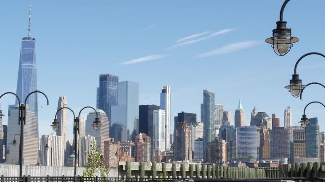 New York City Manhattan Downtown Financial District skyline, World Trade Center tower from New Jersey Liberty state park, United States. Pier lantern lamps and urban cityscape, skyscraper buildings.
