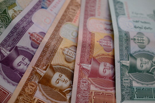 Pile of Mongolian t&ouml;gr&ouml;g (tugrik) banknotes, top view close up. Mongolian t&ouml;gr&ouml;g bills background