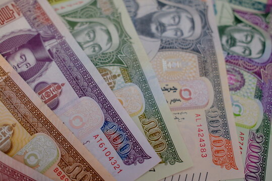 Pile of Mongolian t&ouml;gr&ouml;g (tugrik) banknotes, top view close up. Mongolian t&ouml;gr&ouml;g bills background