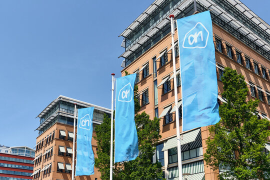 Albert heijn flags at ahold delhaize headquarters in zaandam netherlands european retail business and corporate branding supermarket chain