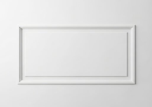 A white picture frame on a wall with no image