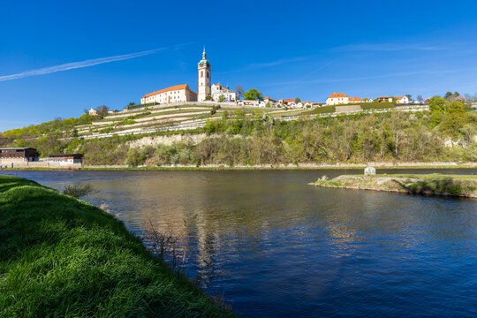 Melnik Castle and church overlooking river landscape in Czechia