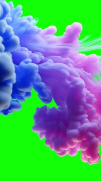 Pastel pink and blue smoke clouds drifting on an empty green screen background, vertical video featuring soft colorful vapor effects for chroma key compositing